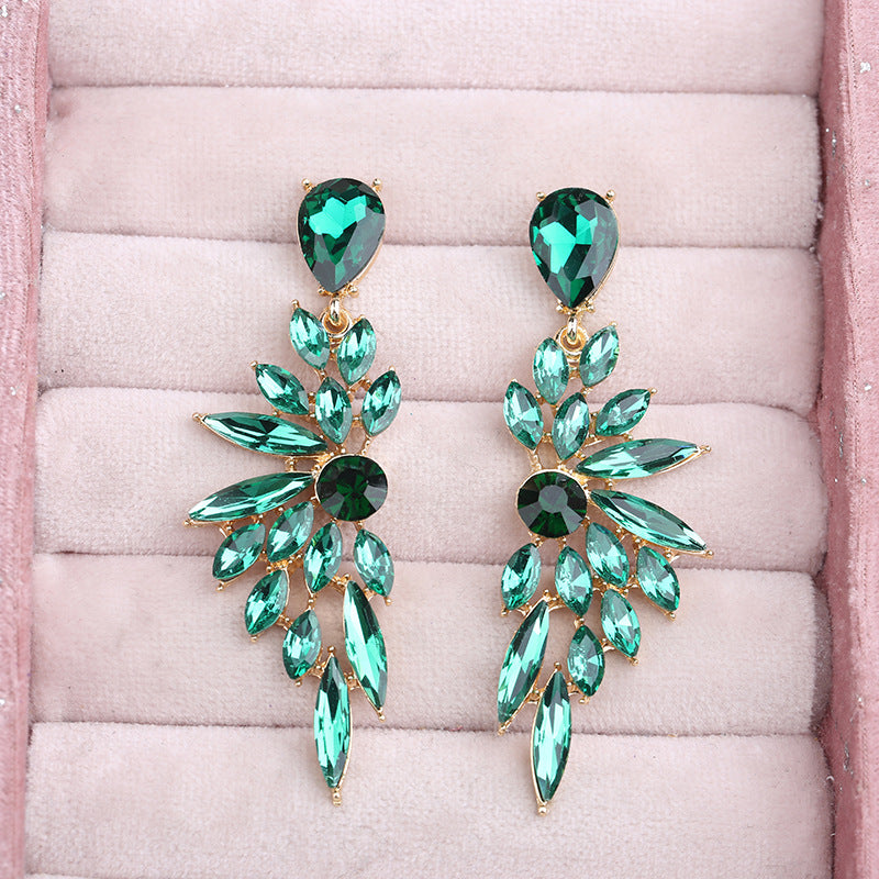 Wholesale Crystal Symmetrical Wings Zinc Alloy Earrings